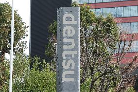 Dentsu's signboard and logo